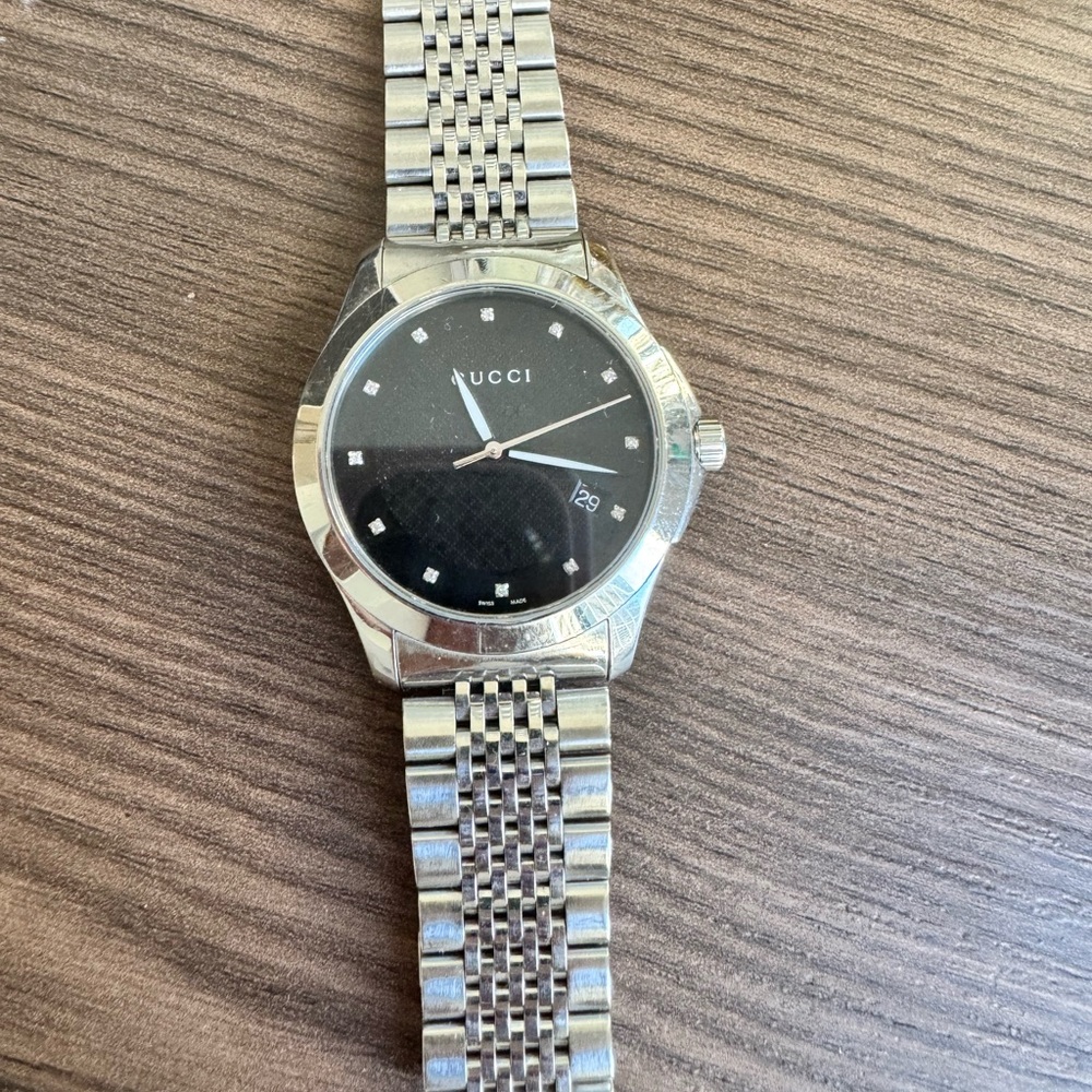 Gucci timeless diamonds black dial silver steel watch
